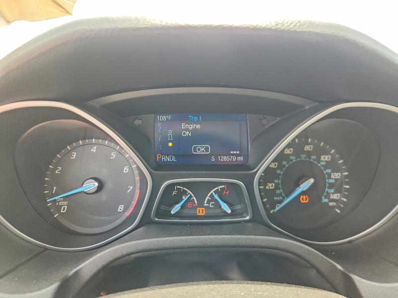 Photo 9 from auction – 2014 FORD FOCUS with VIN 1FADP3K28EL207969
