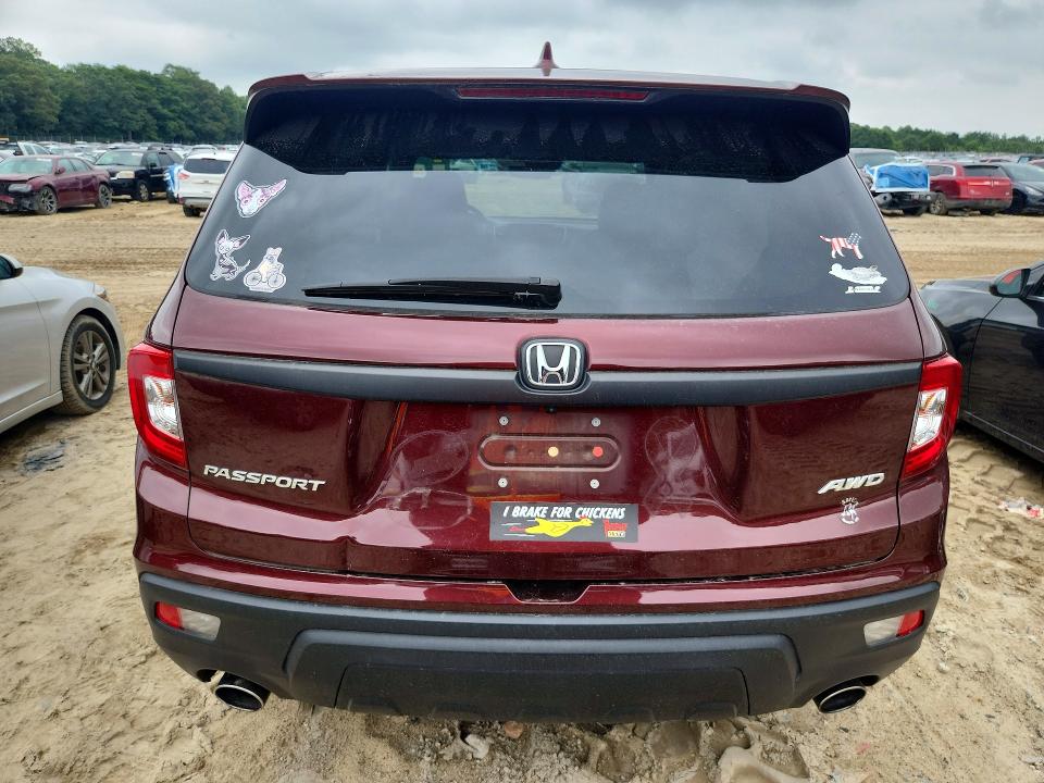 Photo 6 from auction – 2021 HONDA PASSPORT with VIN 5FNYF8H57MB016879