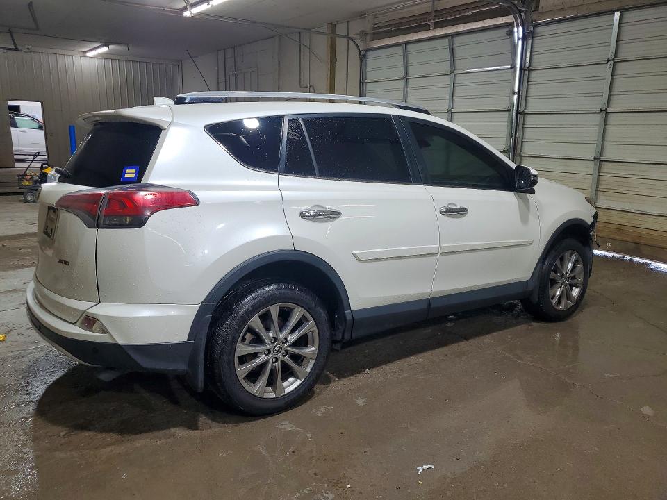 Photo 3 from auction – 2016 TOYOTA RAV4 with VIN JTMYFREV4GJ069840