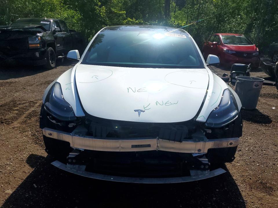 Photo 5 from auction – 2022 TESLA MODEL 3 with VIN 5YJ3E1EA1NF169958