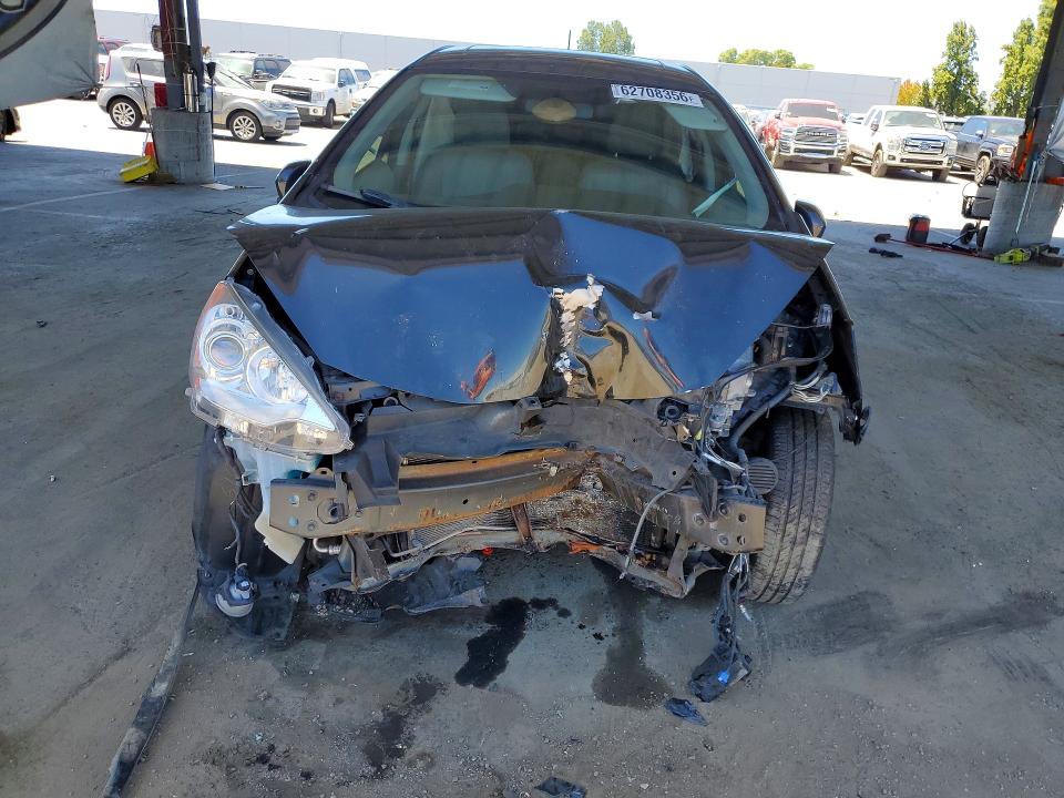 Photo 5 from auction – 2012 TOYOTA PRIUS C with VIN JTDKDTB3XC1030370