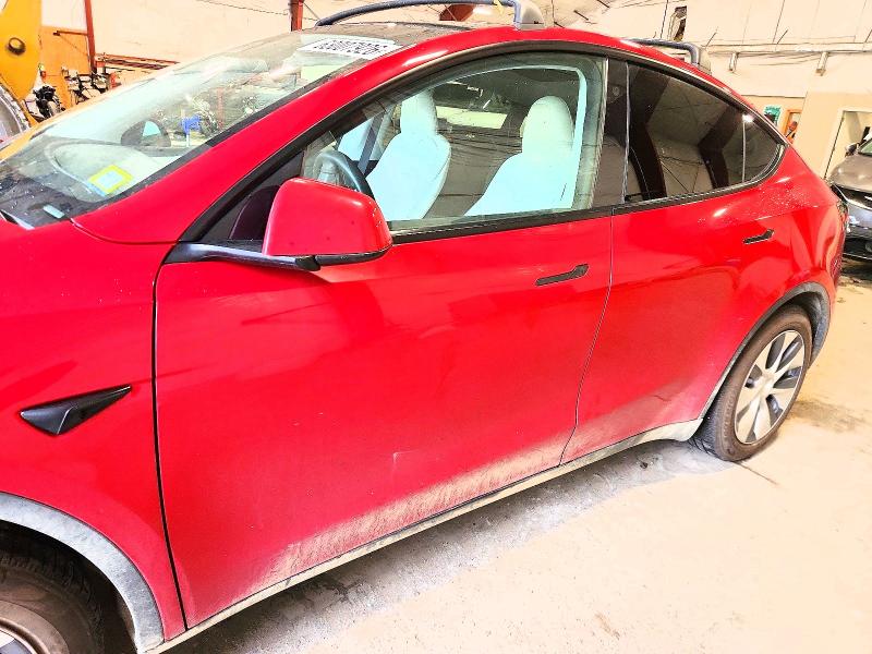 Photo 7 from auction – 2023 TESLA MODEL Y with VIN 7SAYGAEE6PF788810