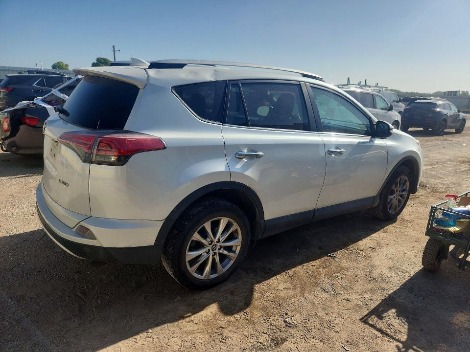 Photo 3 from auction – 2016 TOYOTA RAV4 with VIN 2T3YFREV0GW273780