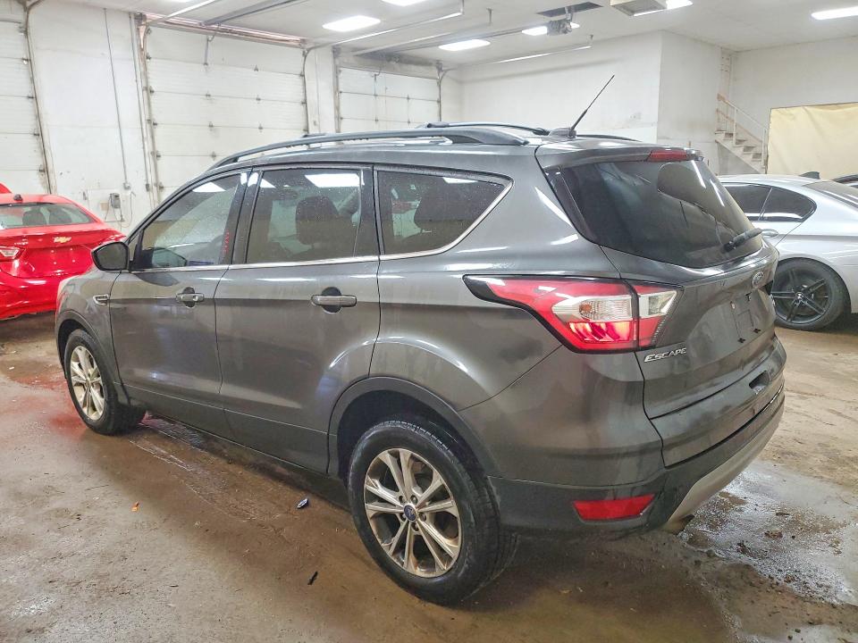 Photo 2 from auction – 2017 FORD ESCAPE with VIN 1FMCU9GD0HUC58467