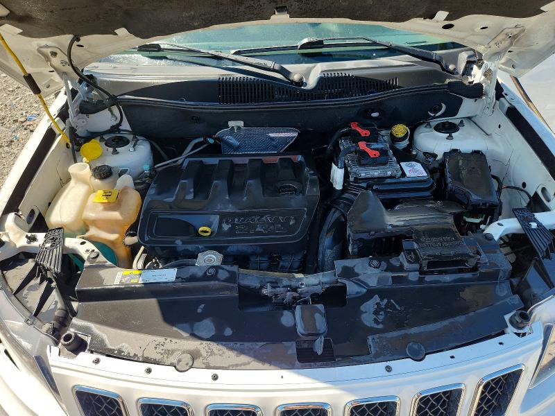 Photo 11 from auction – 2014 JEEP COMPASS with VIN 1C4NJCBB9ED666924