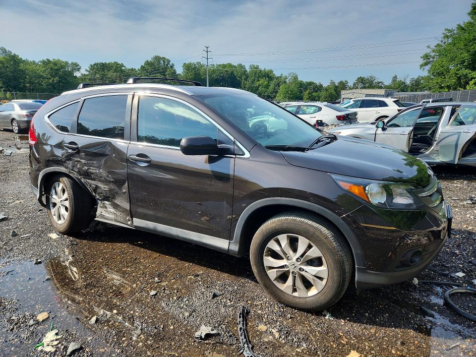 Photo 4 from auction – 2014 HONDA CR-V with VIN 2HKRM4H75EH677835