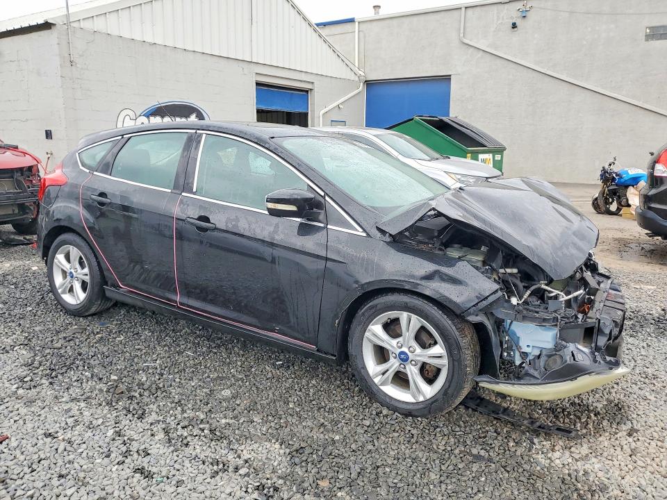 Photo 4 from auction – 2014 FORD FOCUS with VIN 1FADP3K20EL152031