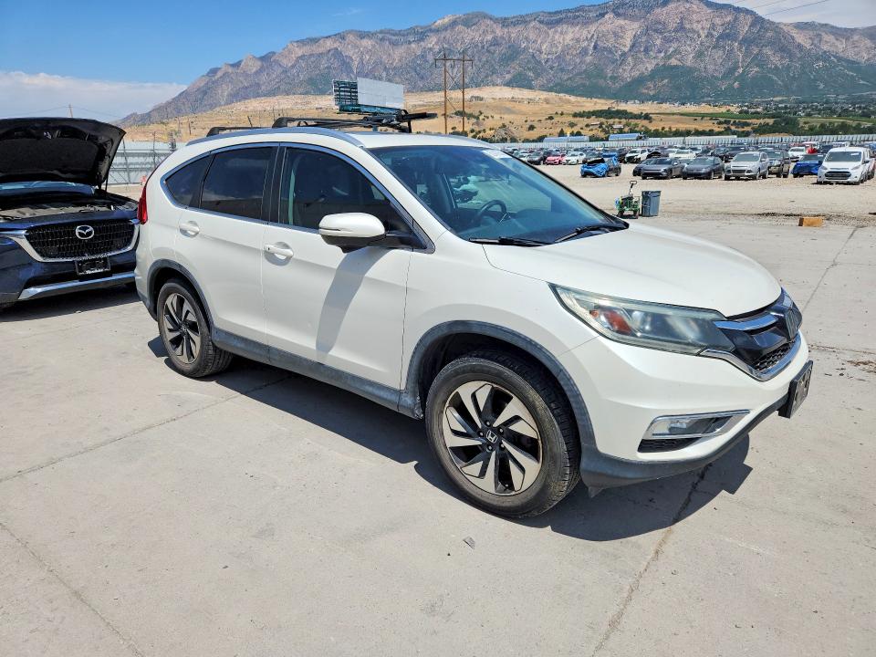 Photo 4 from auction – 2015 HONDA CR-V with VIN 5J6RM4H96FL008076
