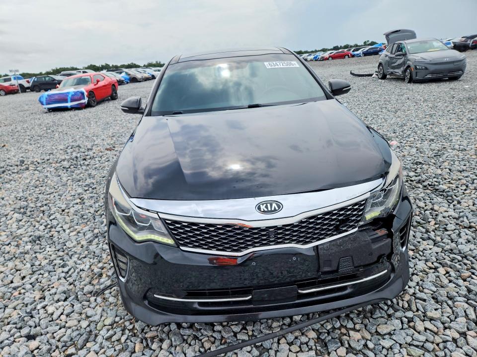 Photo 5 from auction – 2018 KIA OPTIMA with VIN 5XXGV4L21JG244132