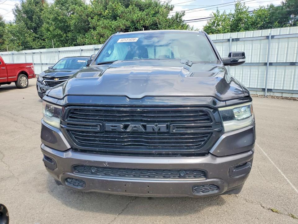 Photo 5 from auction – 2021 RAM 1500 with VIN 1C6SRFJT3MN622957