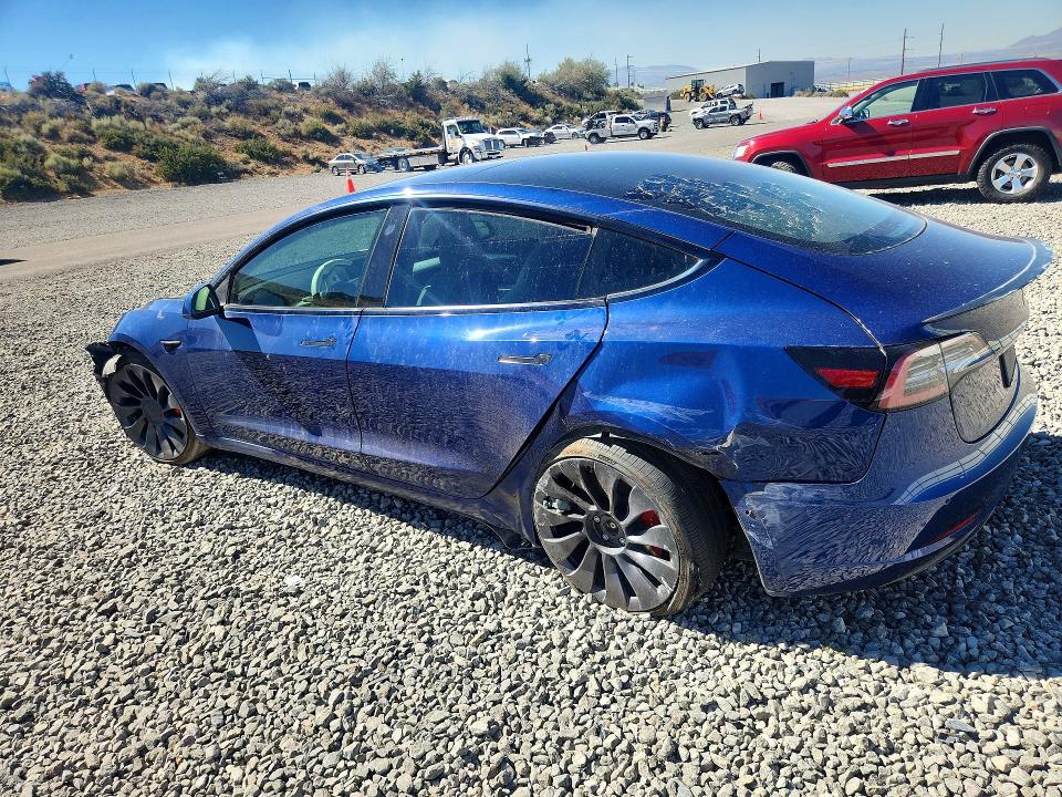 Photo 2 from auction – 2021 TESLA MODEL 3 with VIN 5YJ3E1EC2MF026520