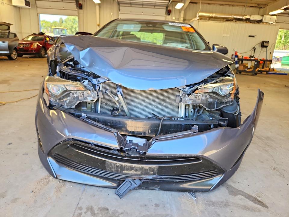 Photo 5 from auction – 2018 TOYOTA COROLLA with VIN 5YFBURHE7JP831052