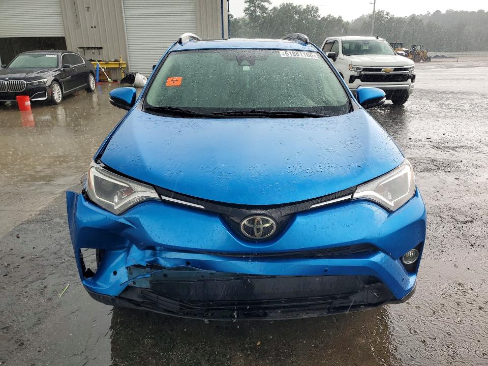 Photo 5 from auction – 2017 TOYOTA RAV4 with VIN JTMWFREV8HJ707788