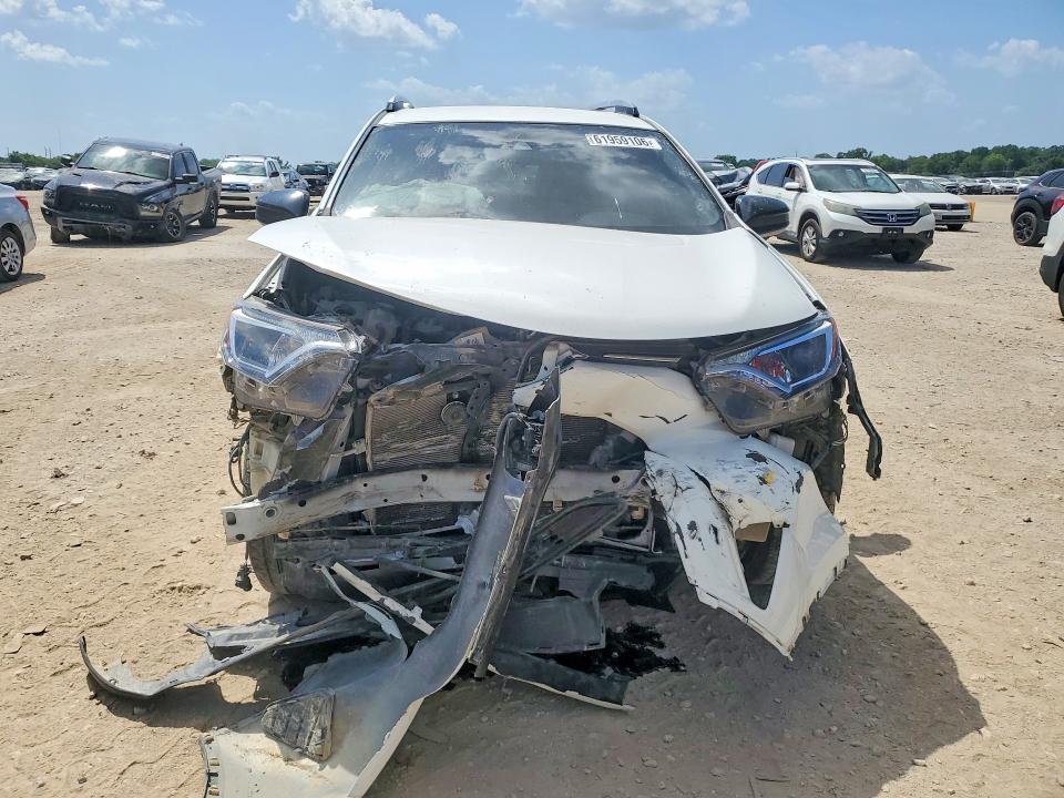 Photo 5 from auction – 2017 TOYOTA RAV4 with VIN JTMBFREV3HJ159391