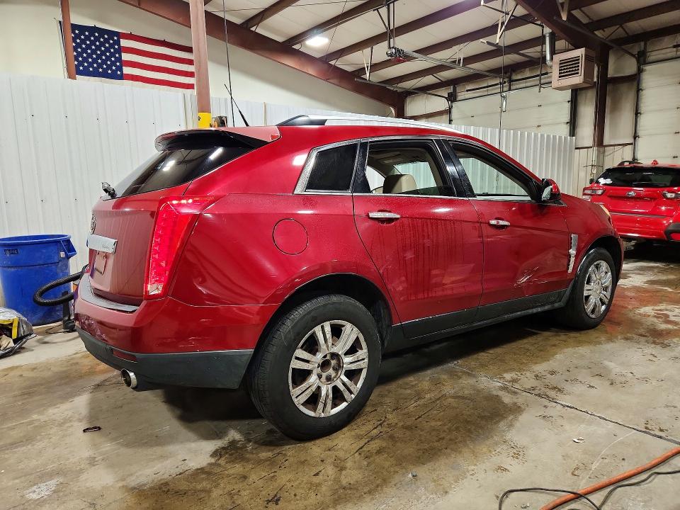 Photo 3 from auction – 2011 CADILLAC SRX with VIN 3GYFNAEYXBS575454