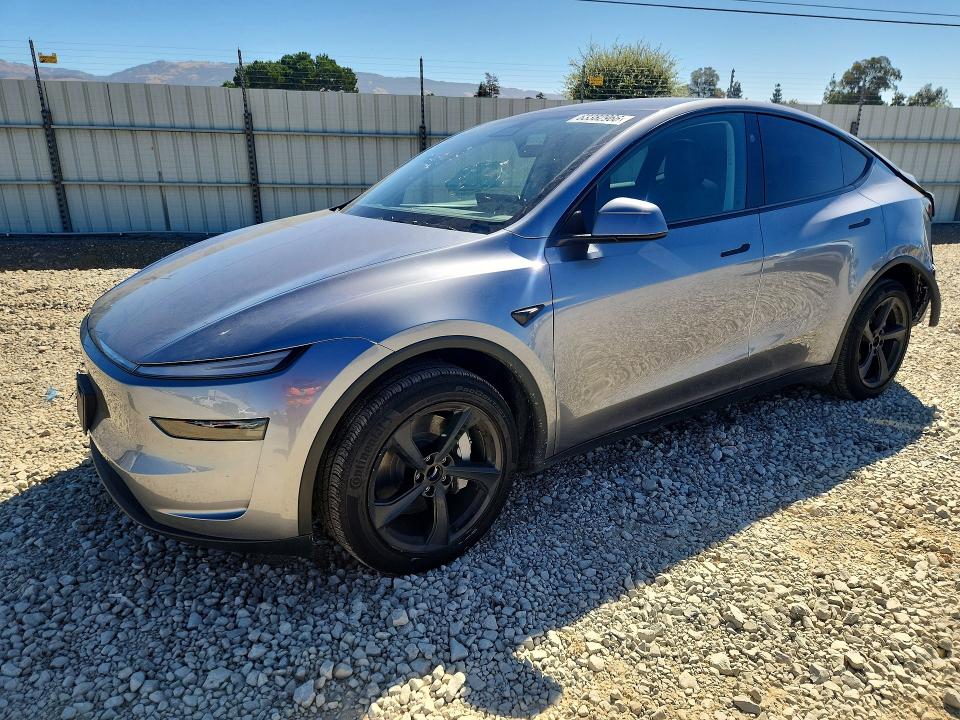 TESLA MODEL Y 2026 with VIN 7SAYGDED2TF550780 - Photo from auction