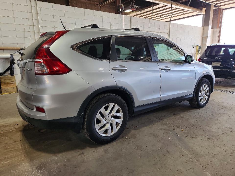 Photo 3 from auction – 2015 HONDA CR-V with VIN 2HKRM4H7XFH617390