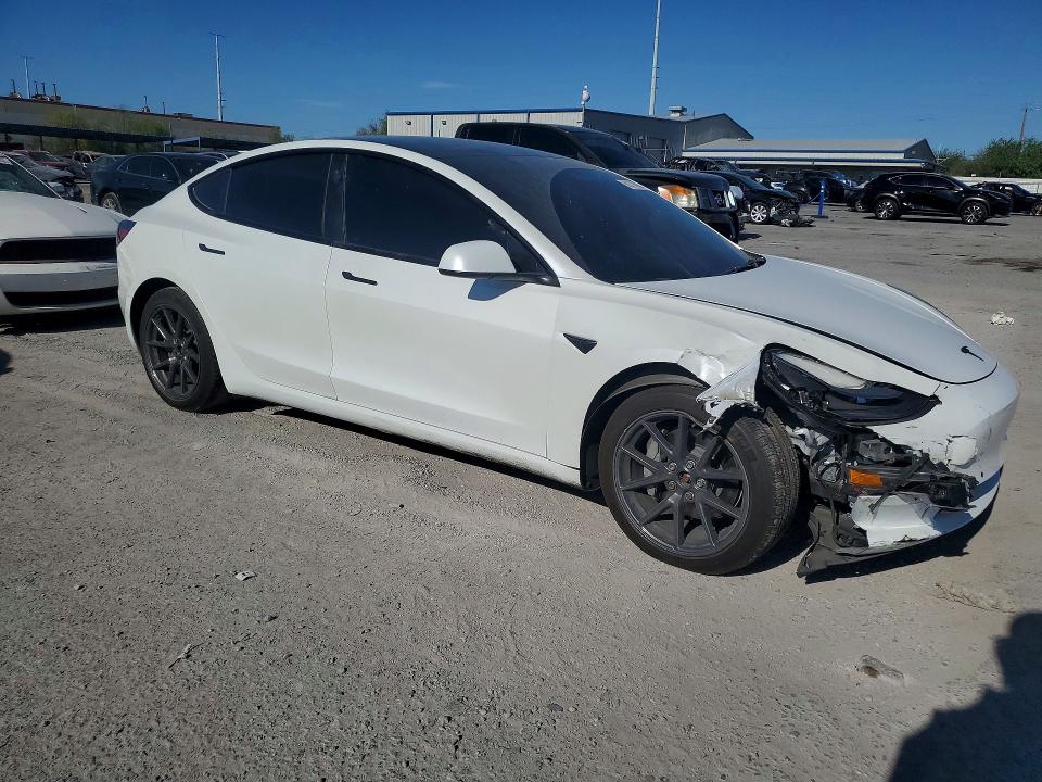 Photo 4 from auction – 2022 TESLA MODEL 3 with VIN 5YJ3E1EB5NF183886