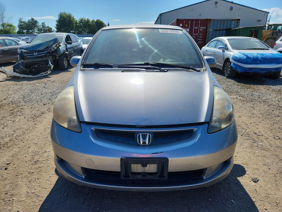 Photo 5 from auction – 2007 HONDA FIT with VIN JHMGD38437S818833