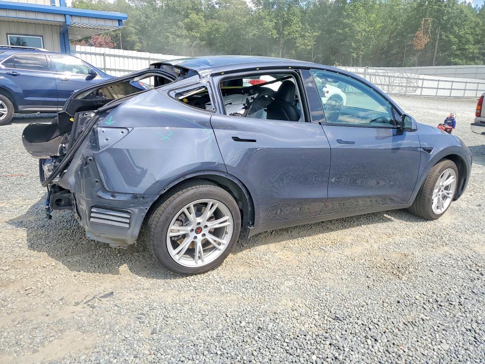Photo 3 from auction – 2023 TESLA MODEL Y with VIN 7SAYGDEE2PA140153