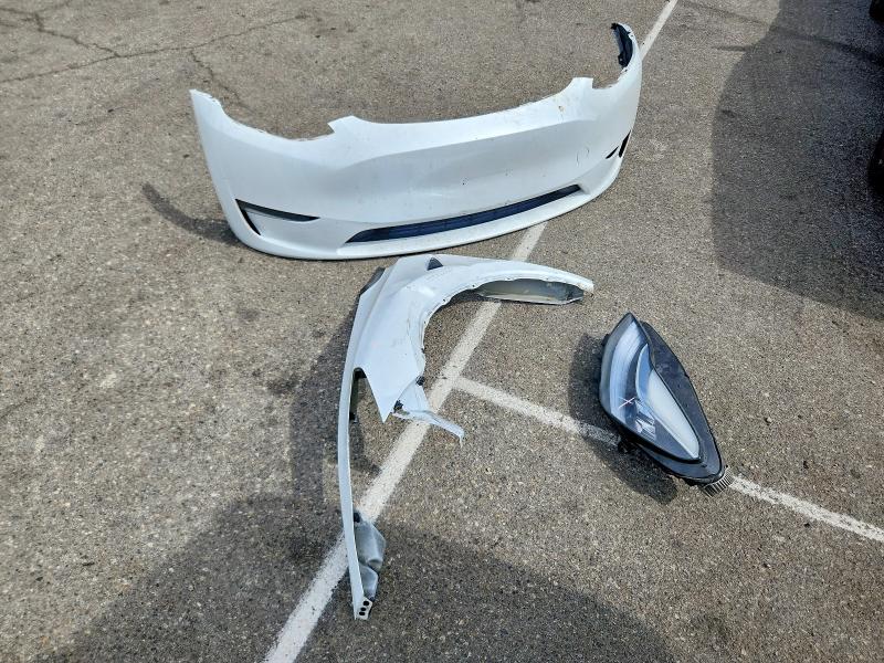 Photo 12 from auction – 2023 TESLA MODEL Y with VIN 7SAYGDEEXPA104968