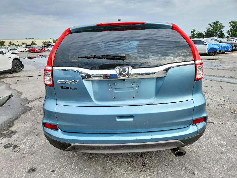 Photo 6 from auction – 2015 HONDA CR-V with VIN 2HKRM3H33FH552647