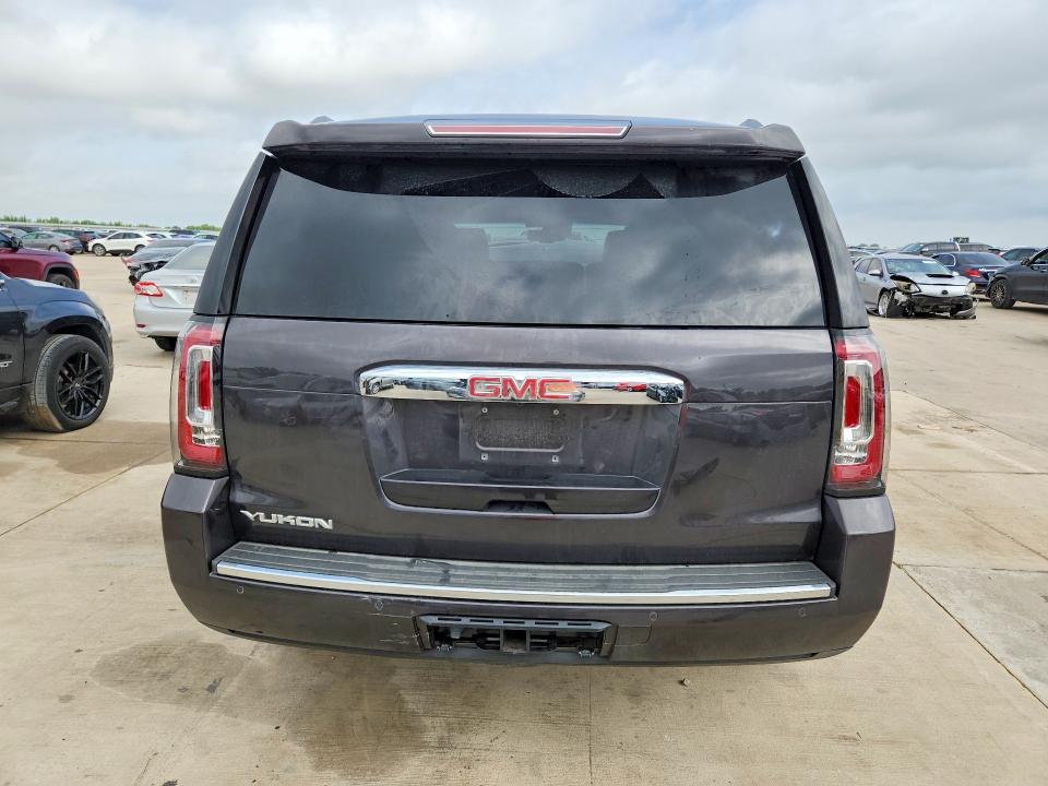 Photo 6 from auction – 2016 GMC YUKON with VIN 1GKS2CKJ2GR454349