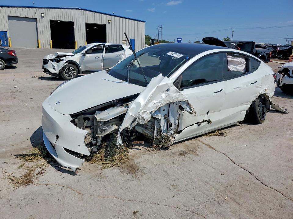 TESLA MODEL Y 2022 с VIN 7SAYGAEE1NF329679 - Фото с аукциона
