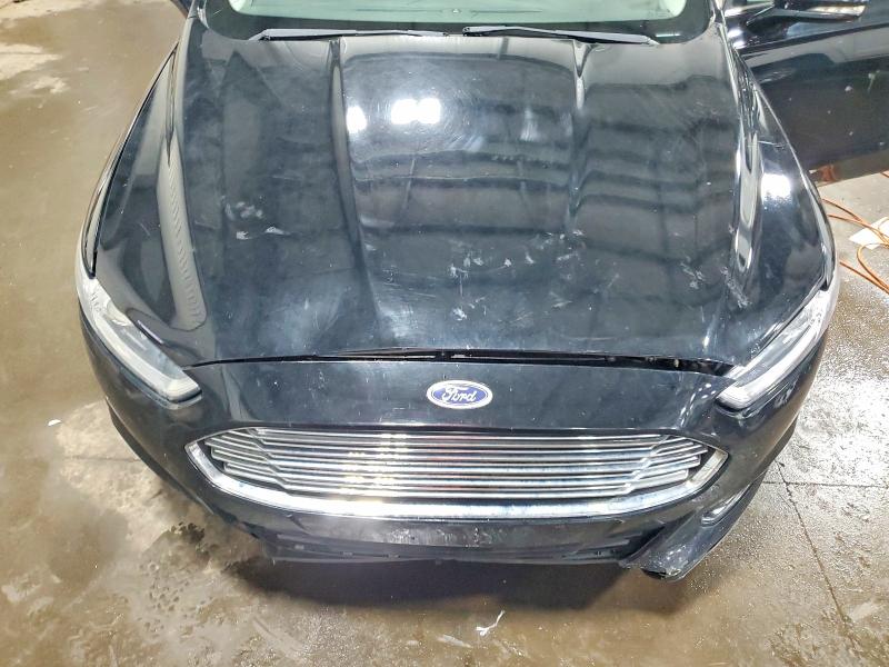 Photo 11 from auction – 2016 FORD FUSION with VIN 3FA6P0H71GR331578