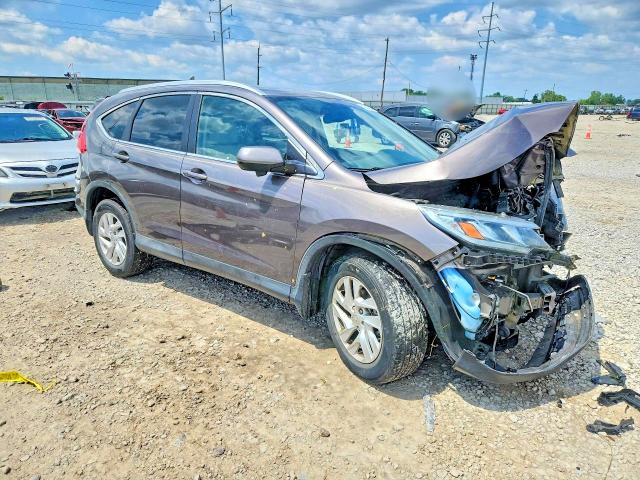 Photo 4 from auction – 2016 HONDA CR-V with VIN 2HKRM4H73GH710477