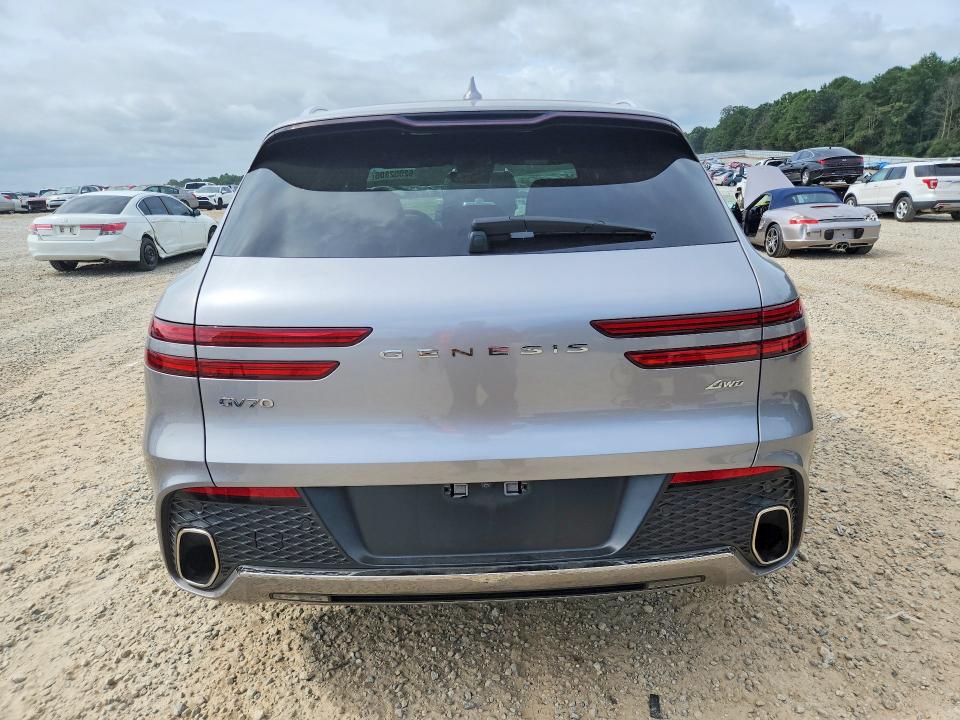 Photo 6 from auction – 2022 GENESIS GV70 with VIN KMUMADTB5NU028442