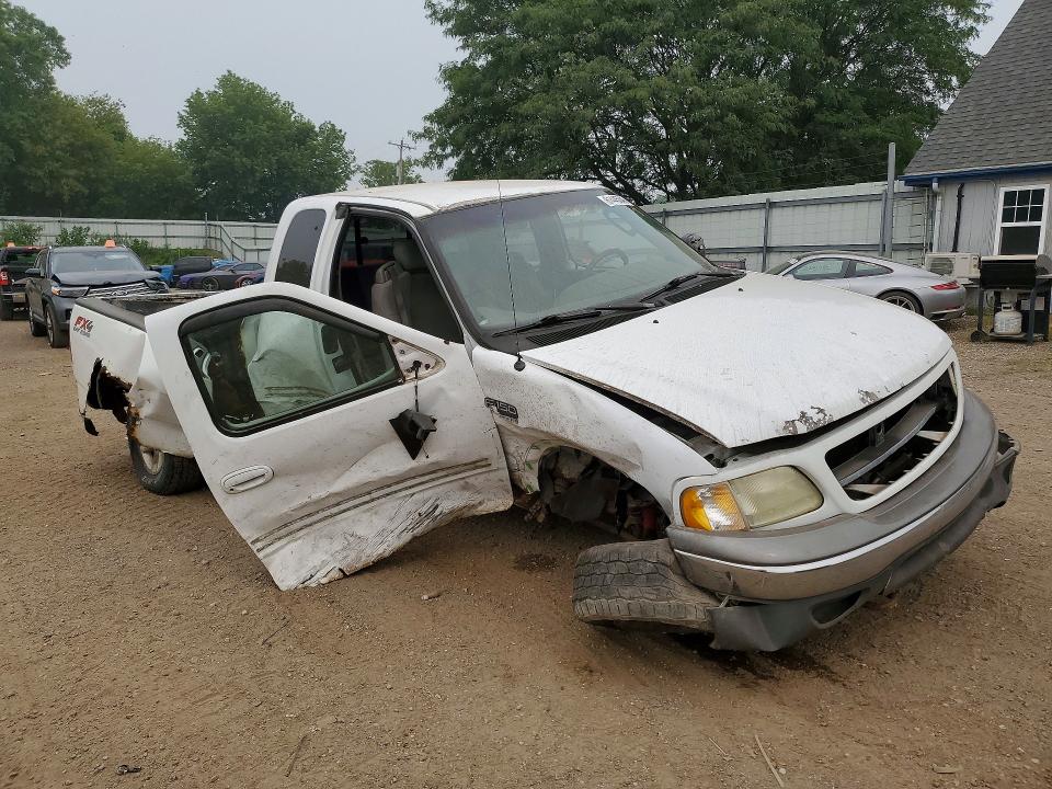 Photo 4 from auction – 2003 FORD F150 with VIN 1FTRX18L03NB42928