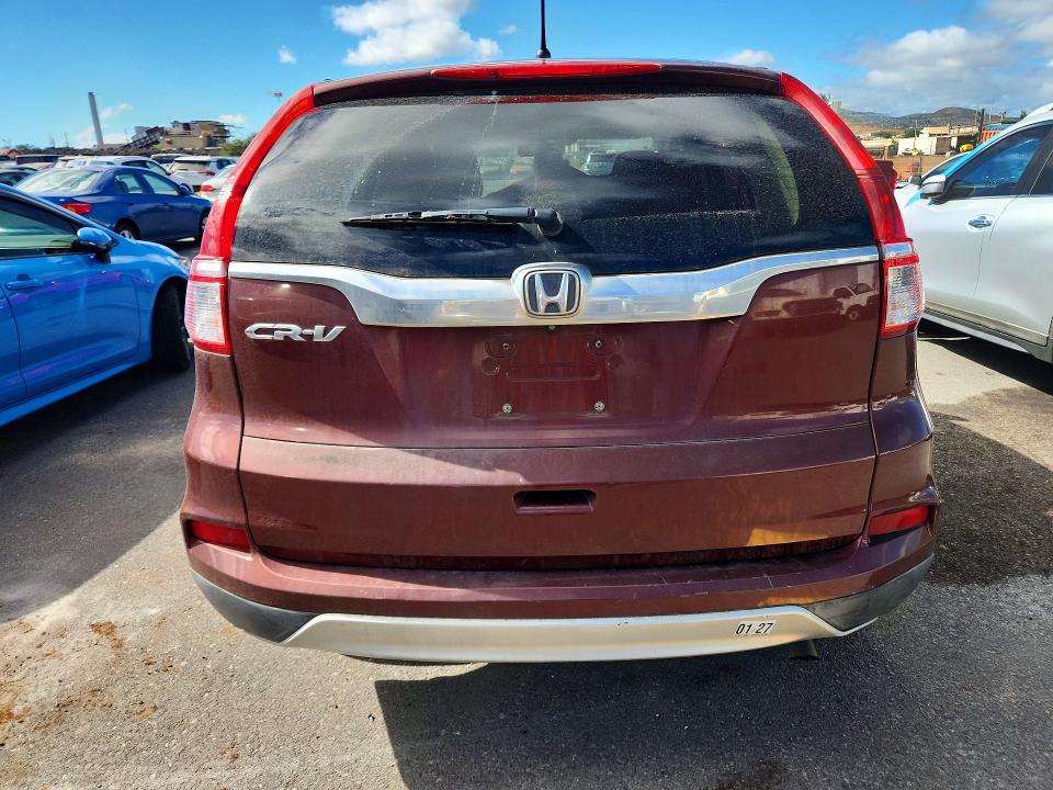 Photo 6 from auction – 2015 HONDA CR-V with VIN 3CZRM3H5XFG709286