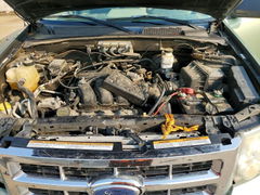 Photo 12 from auction – 2008 FORD ESCAPE with VIN 1FMCU03118KD14774