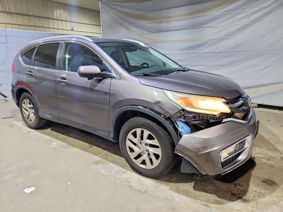 Photo 4 from auction – 2015 HONDA CR-V with VIN 2HKRM4H72FH635835