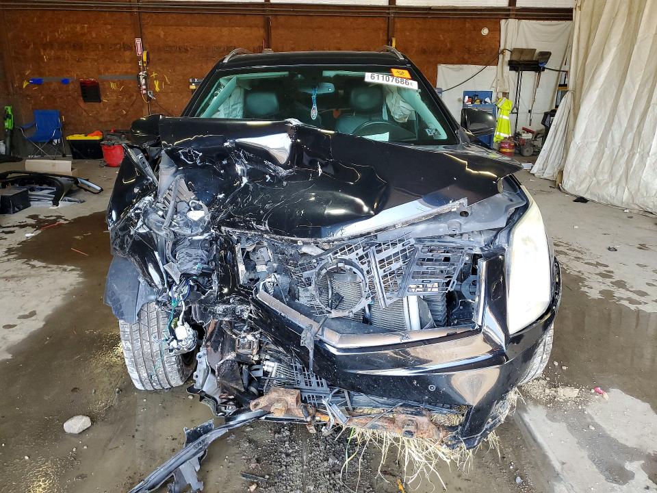 Photo 5 from auction – 2013 CADILLAC SRX with VIN 3GYFNHE38DS646781