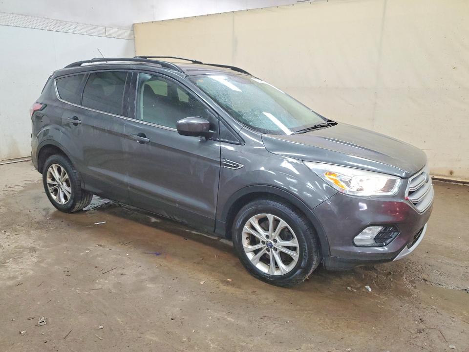 Photo 4 from auction – 2017 FORD ESCAPE with VIN 1FMCU9GD0HUC58467