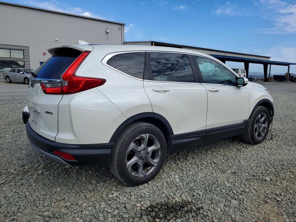 Photo 3 from auction – 2018 HONDA CR-V with VIN 2HKRW2H56JH694750