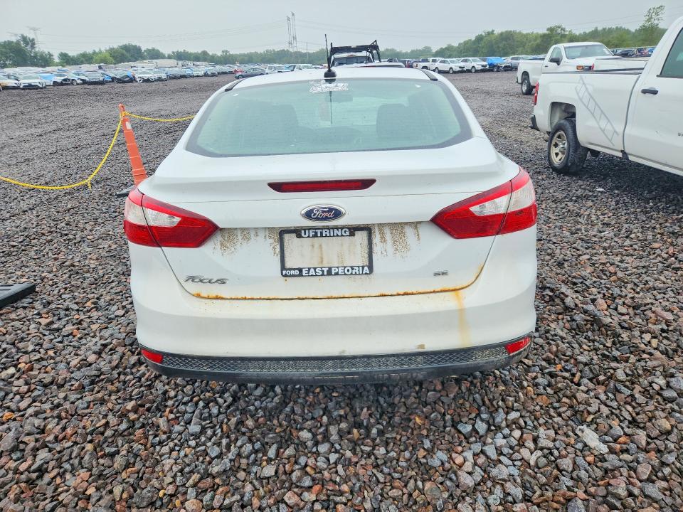 Photo 6 from auction – 2012 FORD FOCUS with VIN 1FAHP3F21CL289276