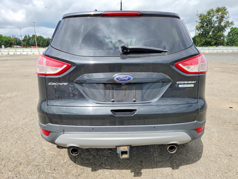 Foto 6 de la subasta – 2013 FORD ESCAPE con VIN 1FMCU0J95DUA59571