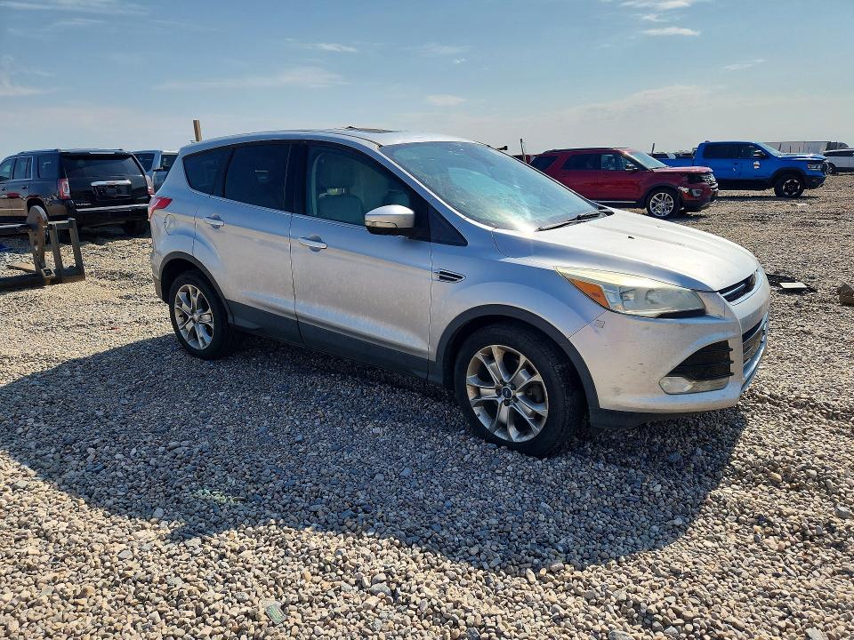 Photo 4 from auction – 2013 FORD ESCAPE with VIN 1FMCU0H91DUC25459