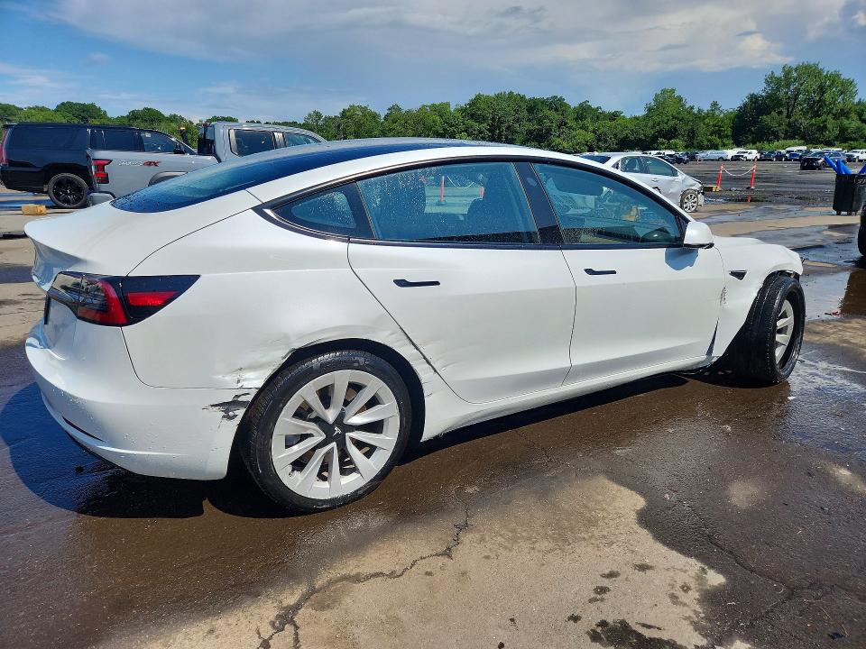 Photo 3 from auction – 2022 TESLA MODEL 3 with VIN 5YJ3E1EA5NF351629