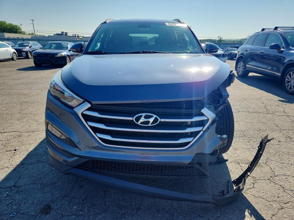 Photo 5 from auction – 2018 HYUNDAI TUCSON with VIN KM8J3CA49JU767320