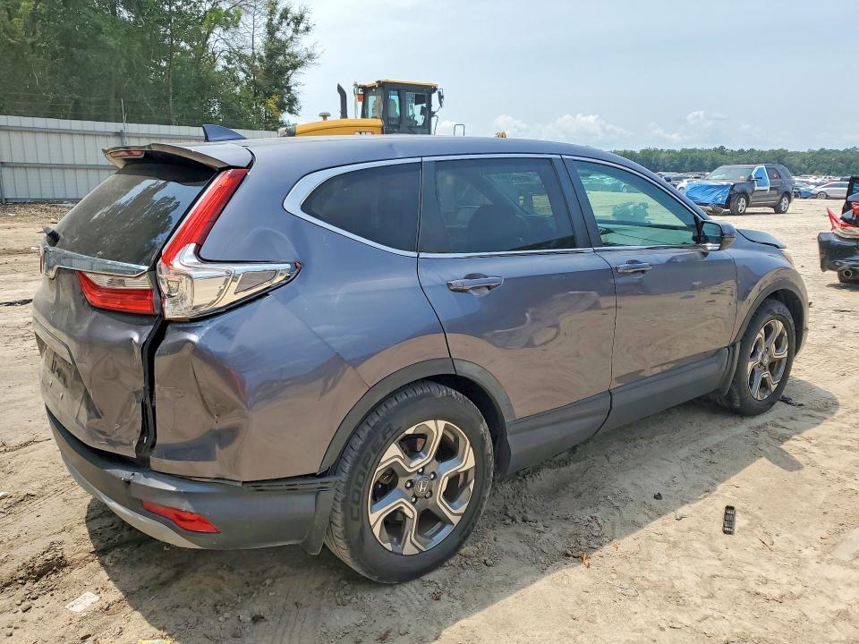 Photo 3 from auction – 2017 HONDA CR-V with VIN 5J6RW1H89HL001335