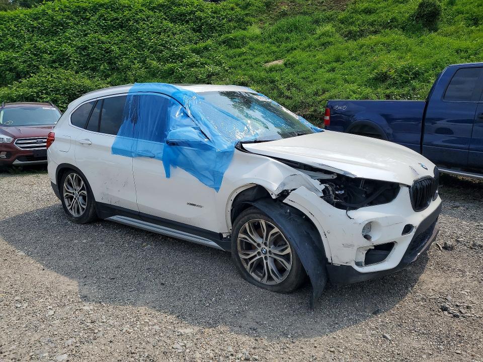 Photo 4 from auction – 2017 BMW X1 with VIN WBXHU7C37H5H37190