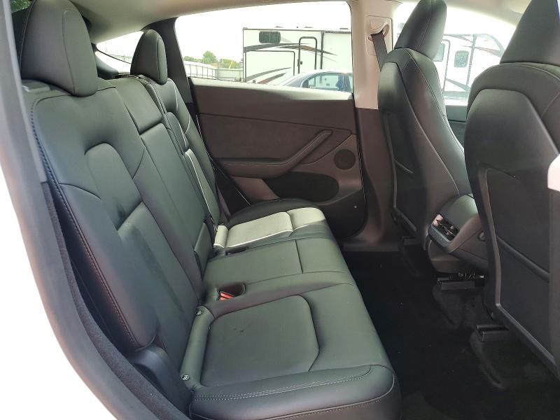 Photo 11 from auction – 2023 TESLA MODEL Y with VIN 7SAYGDEE6PF793782