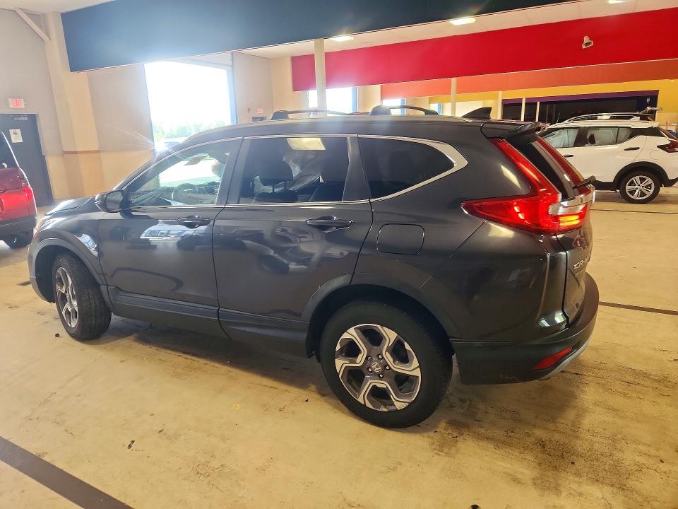 Photo 2 from auction – 2018 HONDA CR-V with VIN 7FARW2H84JE081667