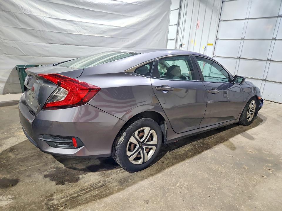 Photo 3 from auction – 2018 HONDA CIVIC with VIN 19XFC2F51JE029838