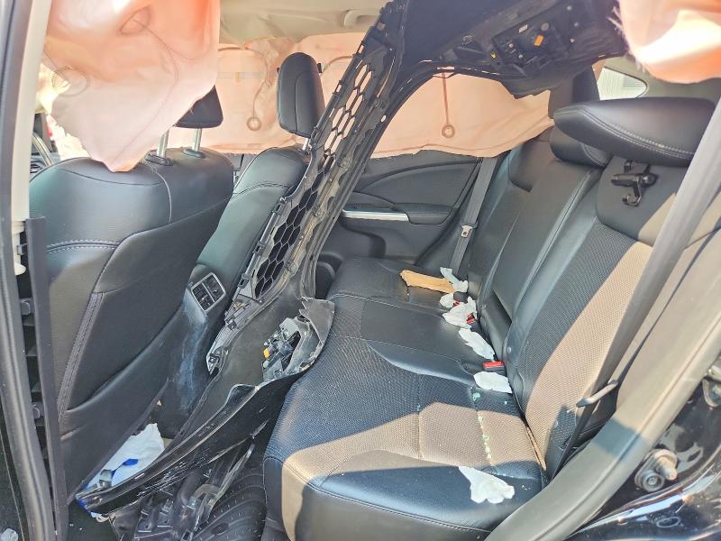 Photo 11 from auction – 2016 HONDA CR-V with VIN 2HKRM3H73GH558582