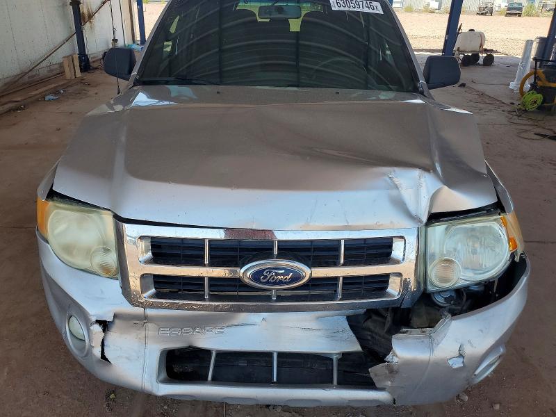 Photo 11 from auction – 2011 FORD ESCAPE with VIN 1FMCU0DG5BKA33555
